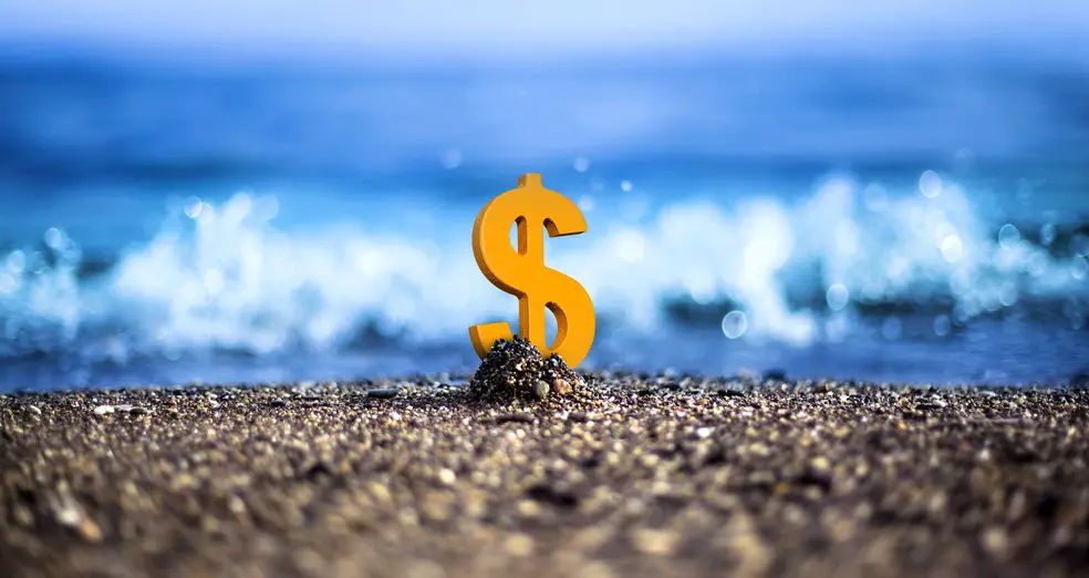 اقتصاد دریا- آیکون دلار کنار ساحل